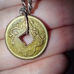 Feng shui coin pendant