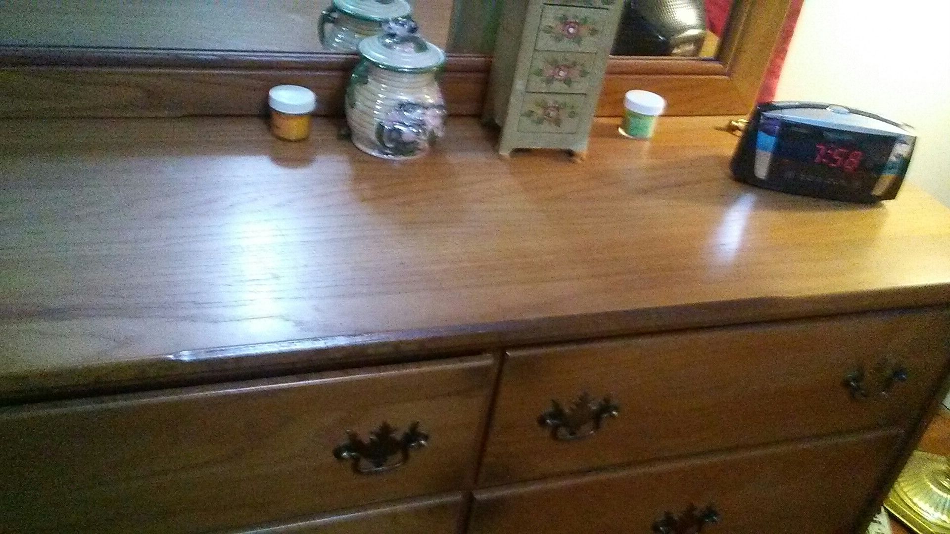 Brown wooden dresser drawer with mirror