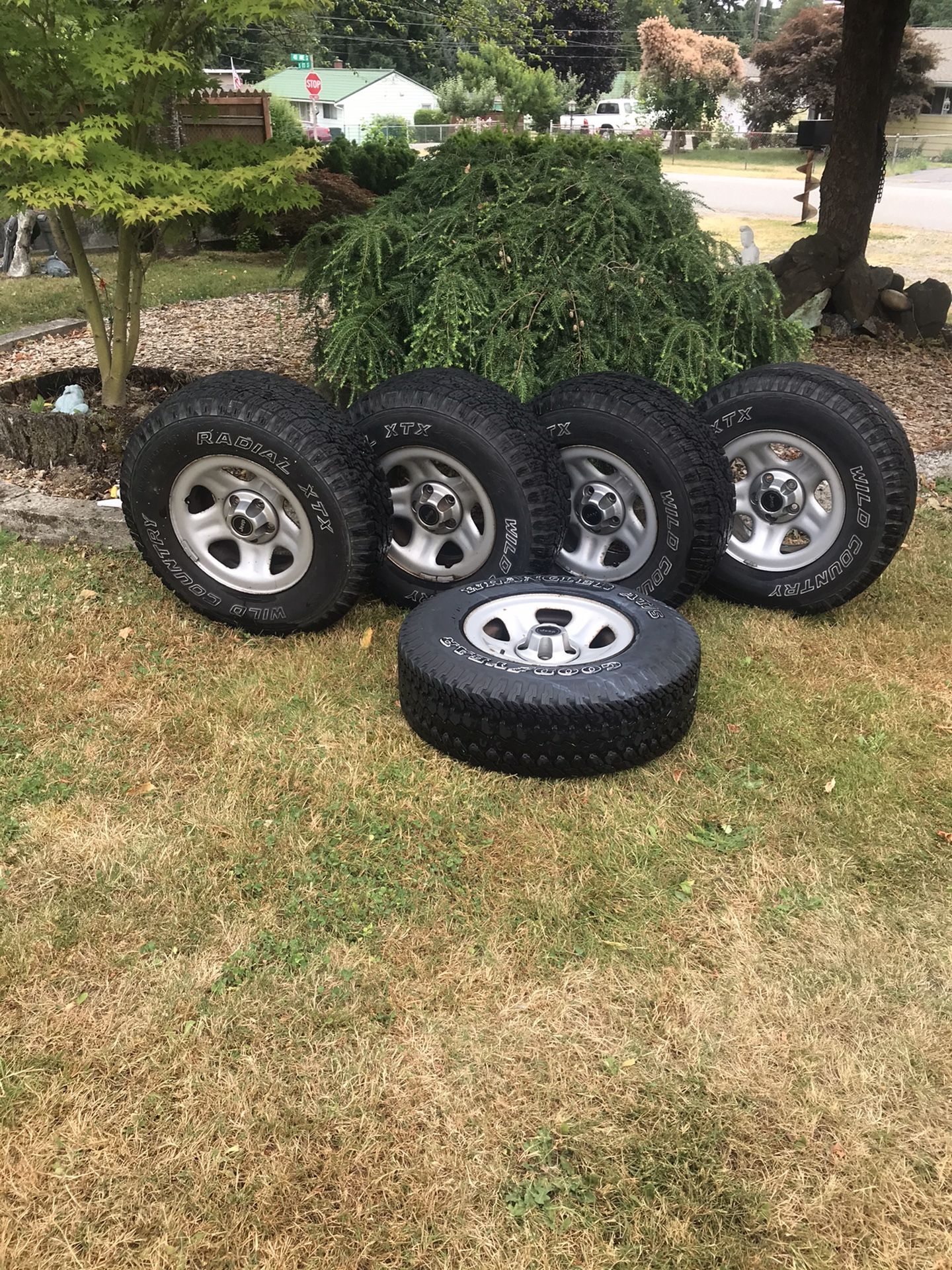 5 Jeep Wrangler wheels & tires, 30x9.5OR15LT M+S, balanced, reasonable tread (see photos), 4 Wild Country Radial XTX and same size Goodyear Wrangler