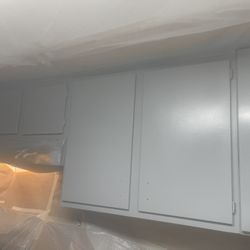We. Paint Cabinets