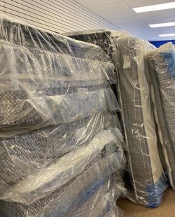 I have a few brand new Queen mattresses still in the original factory plastic