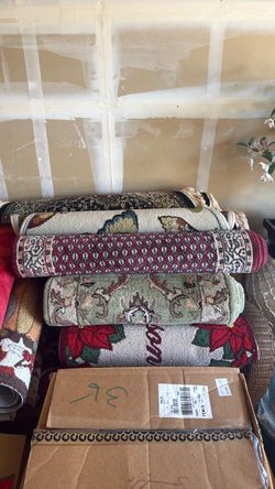 Lots of Rolled Area Rugs – Various Patterns