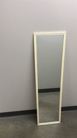 Mirror 3 1/2 feet high and 1foot wide