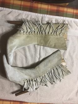 Beige fringed boots