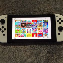 NINTENDO SWITCH MOD with 125 SWITCH GAMES MARIO PARTY,POKEMON Z-A,ZELDA,MARIO KART,SUPER SMASH BROS. and Many More