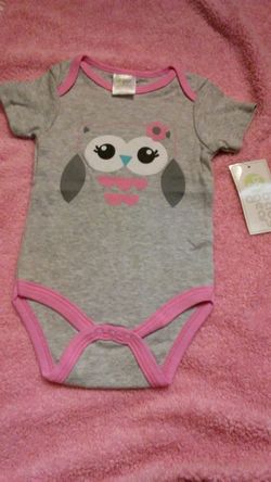 6-9 mos onesie. New!!