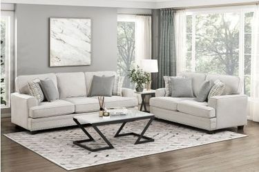 Brand new biege or gray chenille sofa + loveseat with nailhead trimming