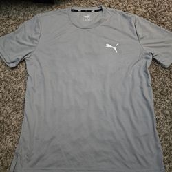 Brand new Men's puma t-shirt, size XL, but fits like large