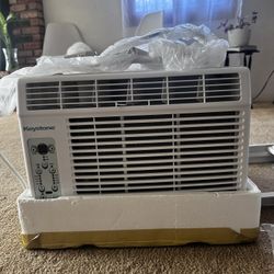 Brand New Ac in the Box / Never Used / Including Remote Control and universal window support ! 