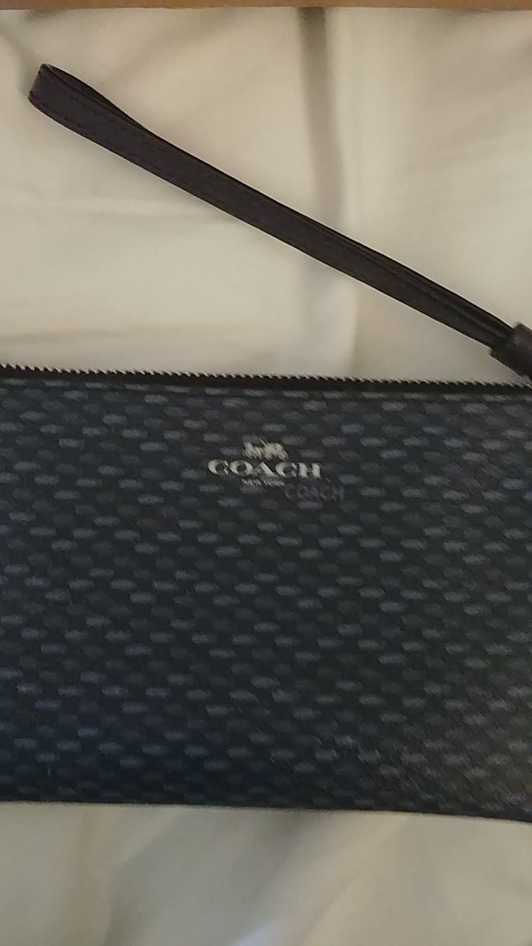 COACH CLUTCH. BRAND NEW IN BOX