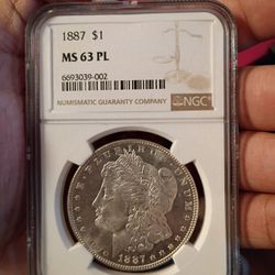 1887 Ms 63 PL Morgan Silver Dollar 