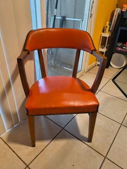 assorted wooden dining chairs