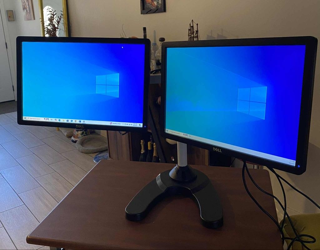 Dual Dell P1913b LED LCD Monitor- 19" 
VGA and display port. 
Nothing wrong