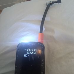 Portable electric tire inflator