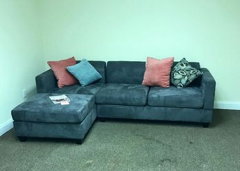 Grey microfiber sectional display item 4 pillows gray