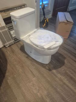 Kholer reach White Two-Piece Toilet with Seat
