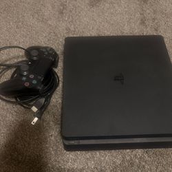 Playstation 4 slim (ps4)