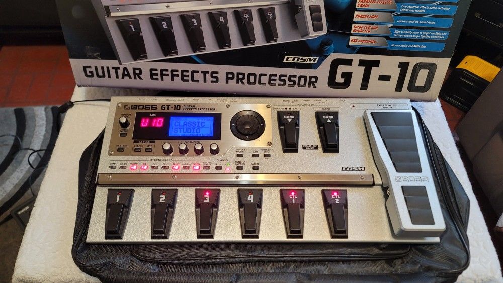 BOSS GT-10 MODELING MULTI EFFECTS PROCESSOR FLOOR GUITAR PEDAL IN SILVER COLOR.