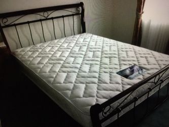 Queen mattress and box springs at 1:25