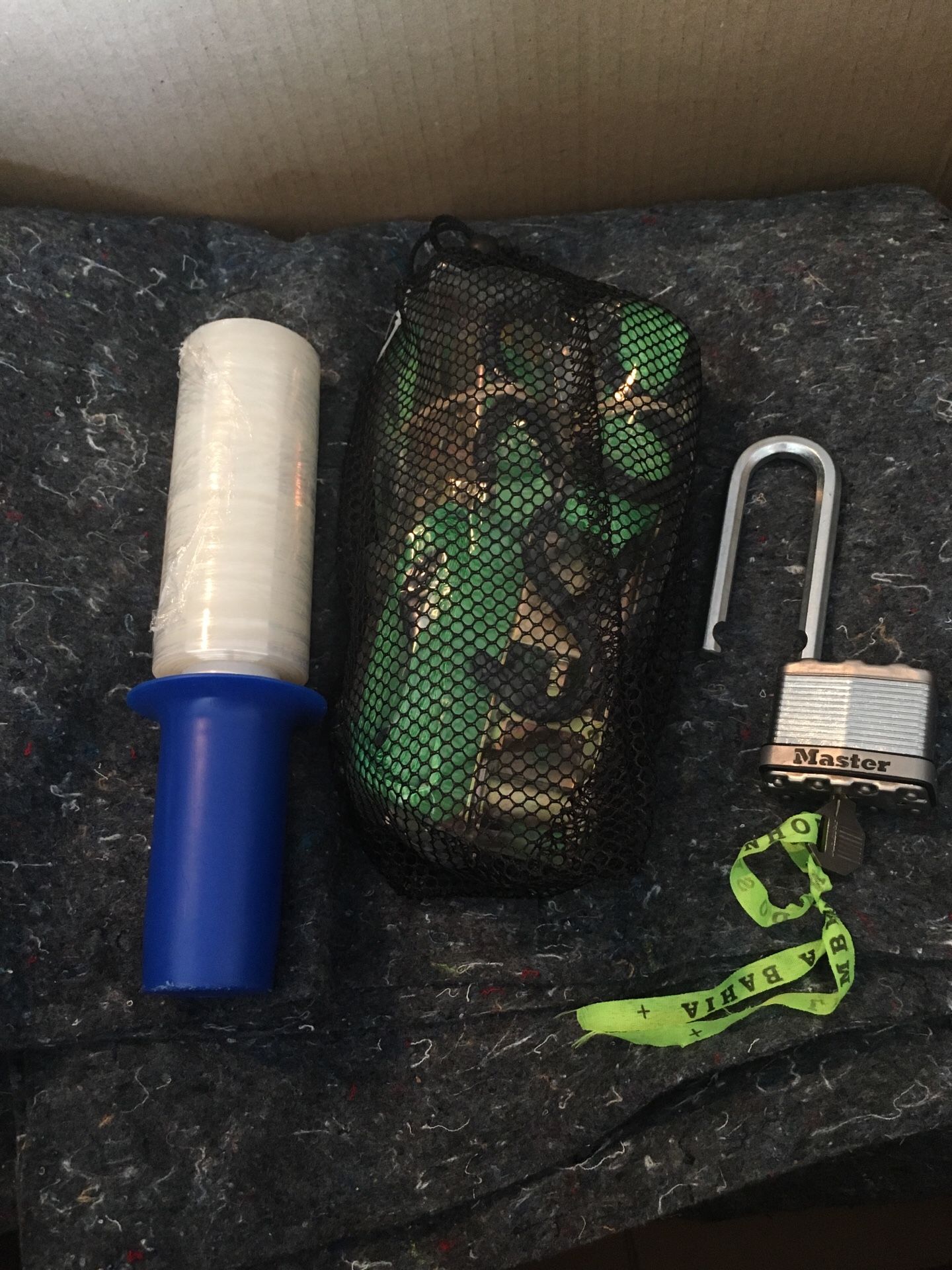 Moving supplies! 17 moving blankets, lock (relocube, pod, and U-Haul compatible), ratchet straps, and half roll of plastic wrap