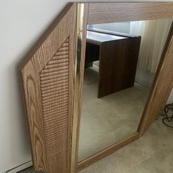 A mirror for the chest of drawers or on the wall