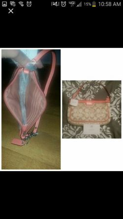 Brand new never used small coach clutch purse