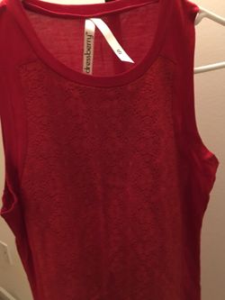Red color body hugging sleeveless dress. Completely new. Size small. Never used