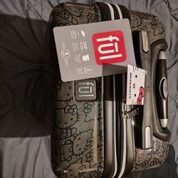 Hello Kitty black suitcase ( Brand New ) Never Used!