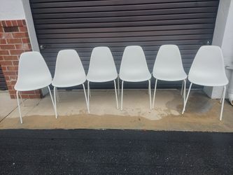 Set of 6 MCM  Molded Poly Propylene with Powder Coated Metal Legs.