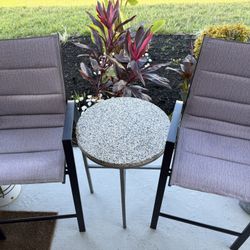 2 bar counter chairs and top marble table 