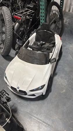 Used Like New 12V Ride On Car for Kid BMW M4 Battery Powered Vehicle Car