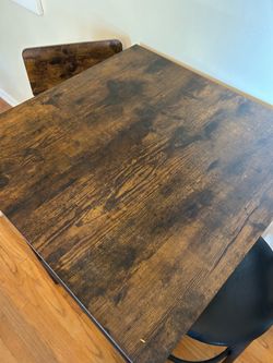 Round bistro table with chairs unassembled in box