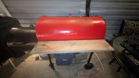 Brinkman Grill & Weber Grill with rotisserie.