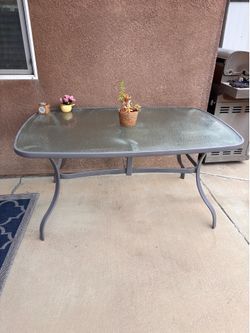 Patio table with umbrella stand