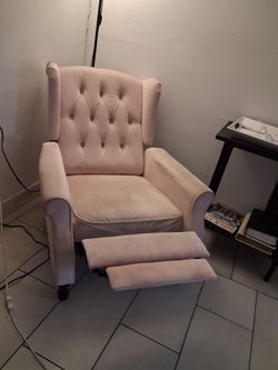 Pink velvet recliner
