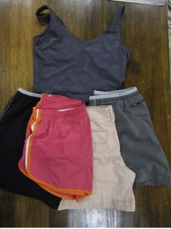 5 PIECE BUNDLE WOMEN'S (NIKE/REI & CALVIN KLEIN) FOUR SHORTS 1NIKE M BRIDE PINK