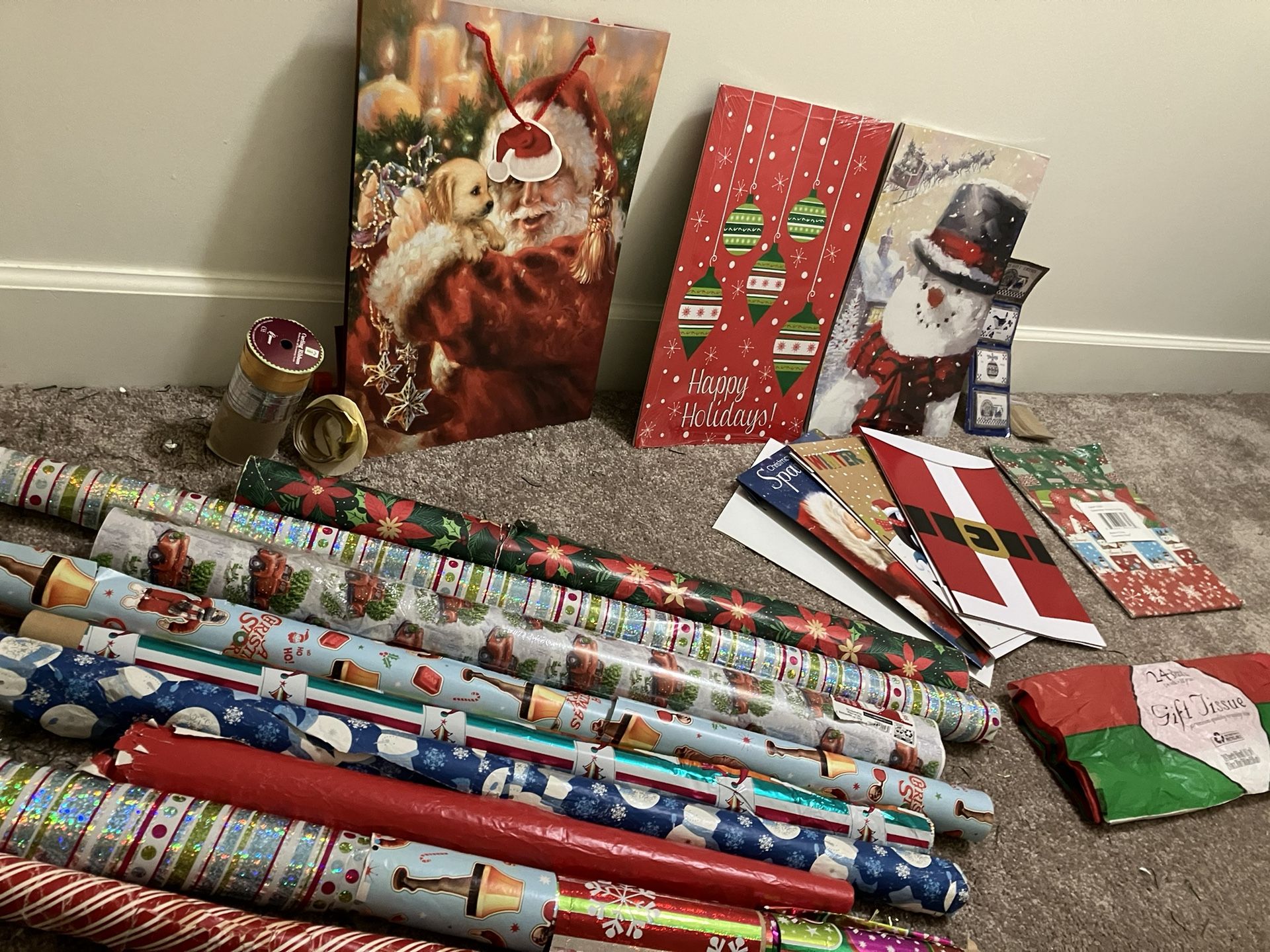 Christmas Wrapping Paper, Tissue, Ribbons, Tags, Boxes, And A Bag