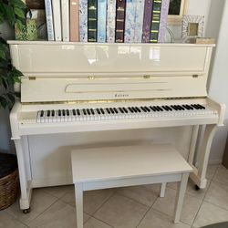 Falcone upright ivory Piano