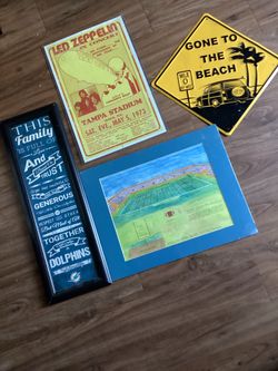 Football,zeppelin and beach signs