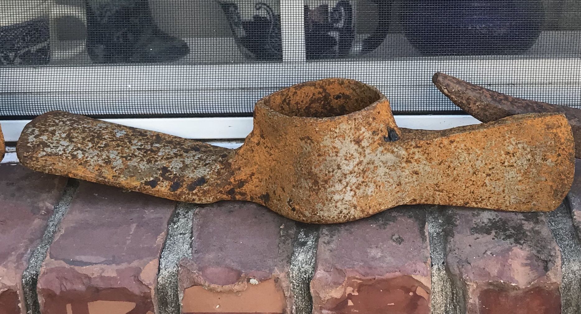 Antique/vintage pick axe heads