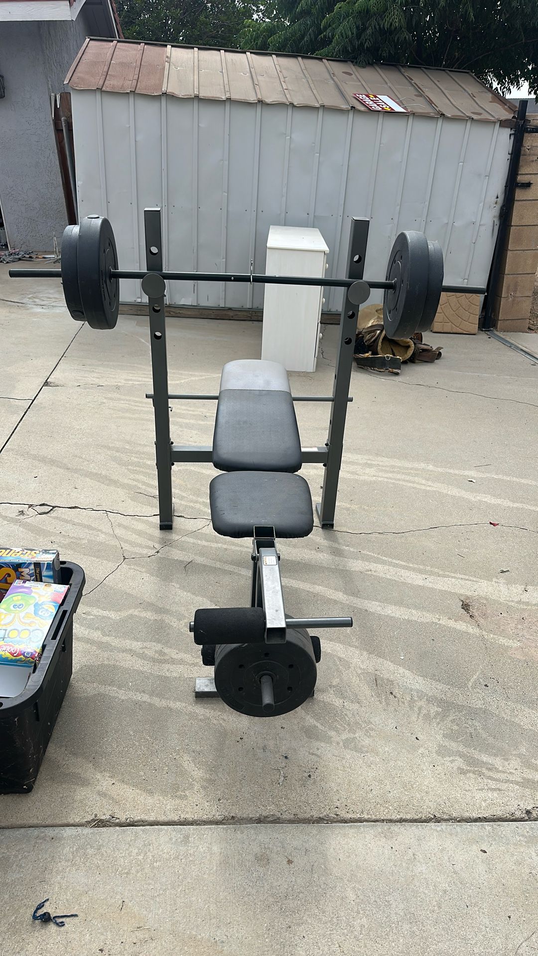 Bench with hundred pound weights
