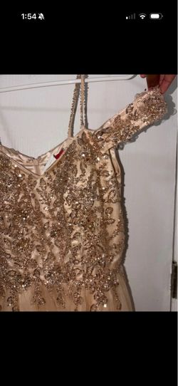 A elegant dress with gold flowers