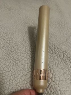 Tyme  iron/ curler