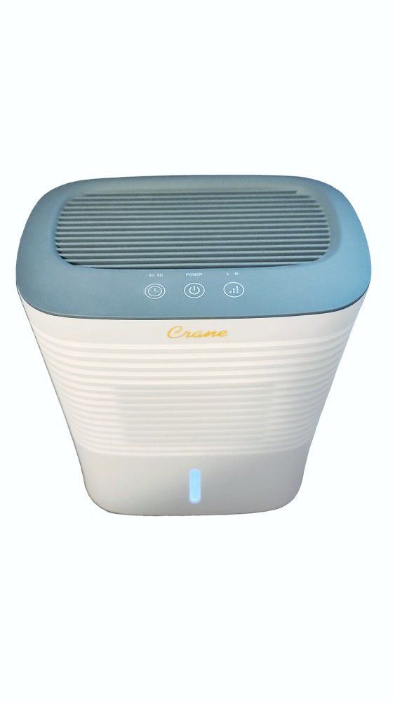 **Crane Compact Dehumidifier: Breathe Easy and Stay Dry**