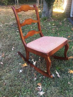 Racking antique chair