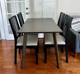 Dark gray dining table and chairs
