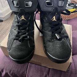 used jordan retro dmp black and gold mens size 10