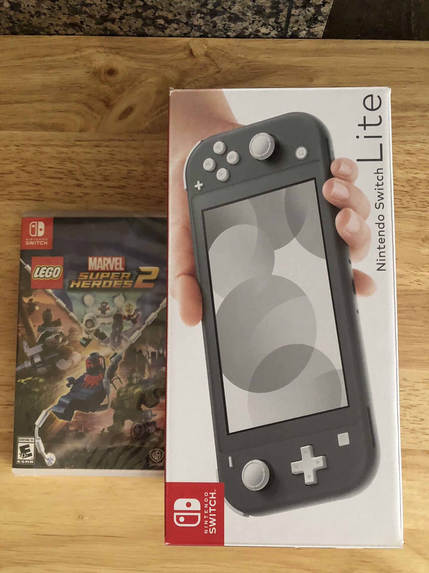 Brand new Nintendo Switch Lite and game