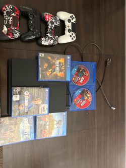 PS4 with games and remotes