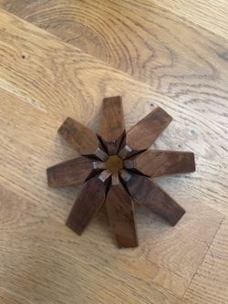 Wooden trivet for hot dishes